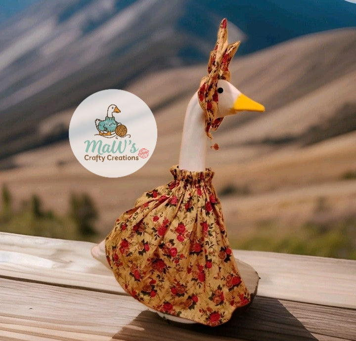 Porch Goose 23-28 inch Rose print dress with matching bow.