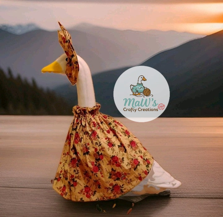 Porch Goose 23-28 inch Rose print dress with matching bow.